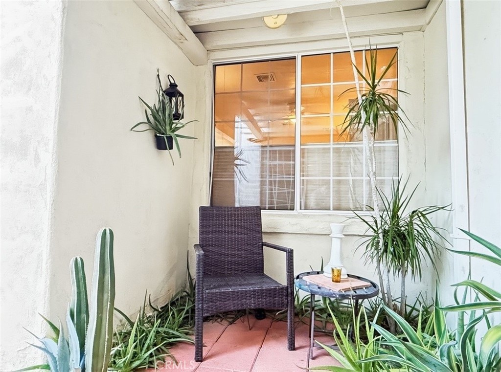 1932 South Barona Road Palm Springs, CA 92264 - Photo 5 of 19 a view of a room with furniture and a potted plant