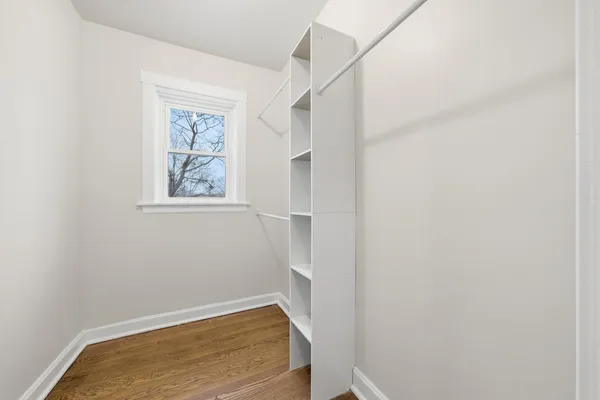 a picture of a bench in front of a door