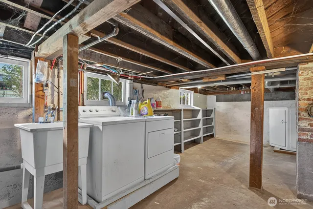 a white refrigerator freezer sitting inside of a kitchen