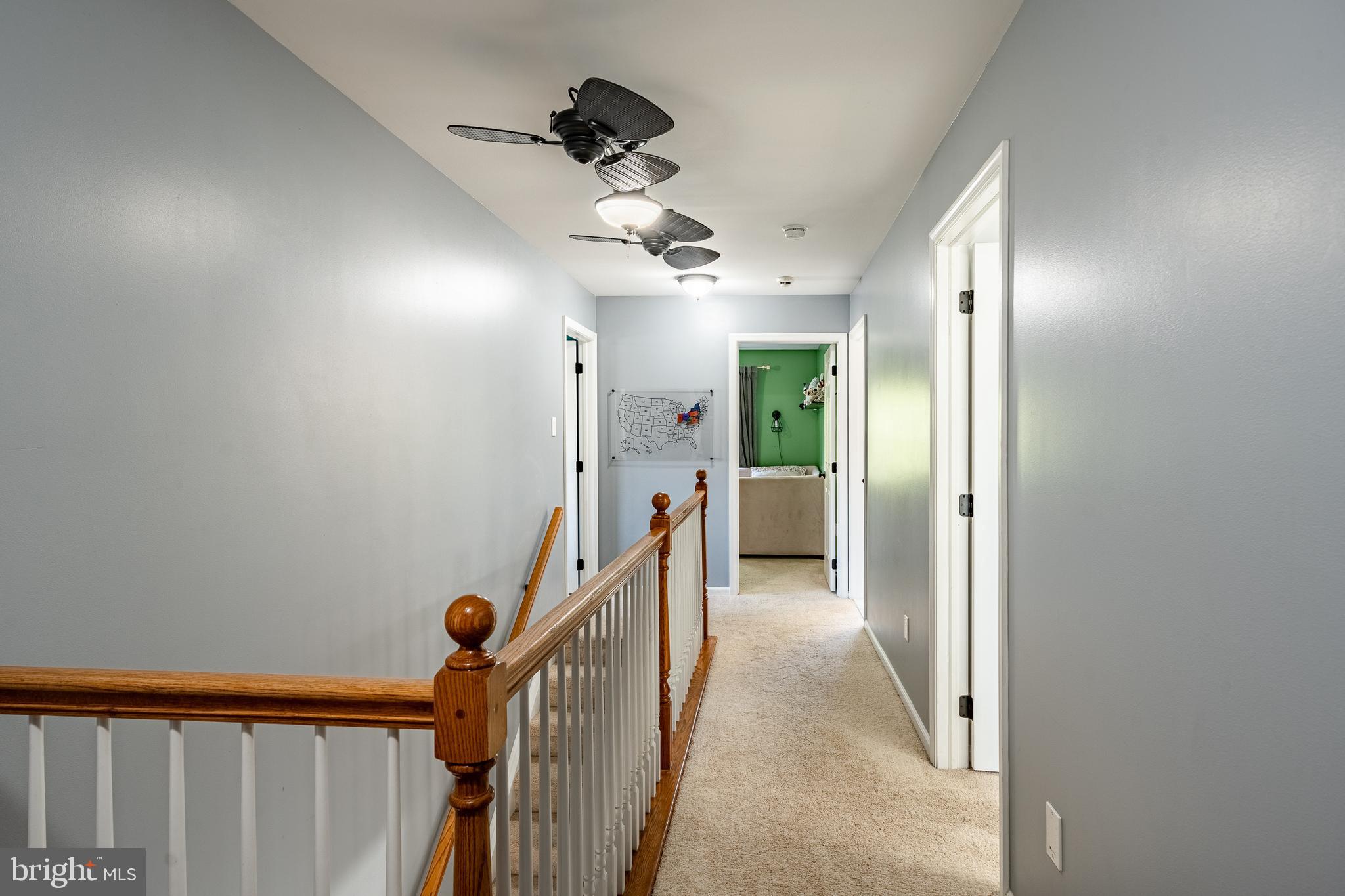 116 Hartman Road Pottstown, PA 19465 - Photo 20 of 49 a view of a hallway with a chandelier