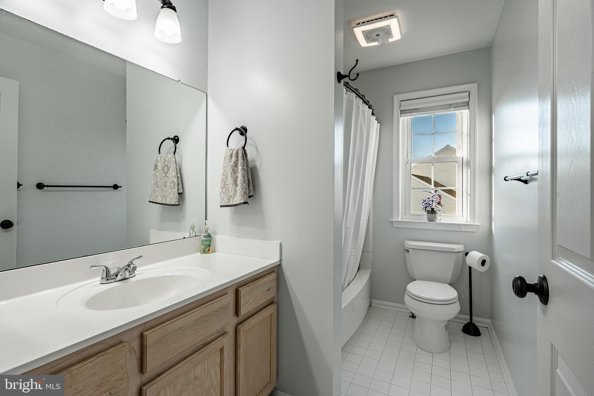 116 Hartman Road Pottstown, PA 19465 - Photo 28 of 49 a bathroom with a granite countertop sink toilet and shower