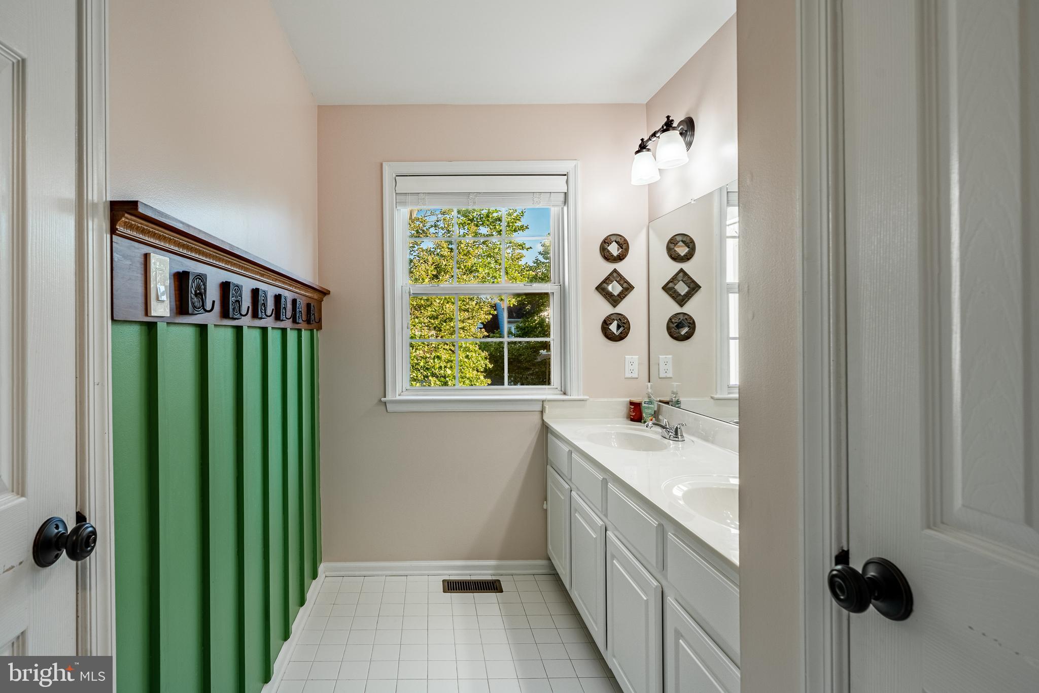 116 Hartman Road Pottstown, PA 19465 - Photo 31 of 49 a bathroom with a sink and a large mirror
