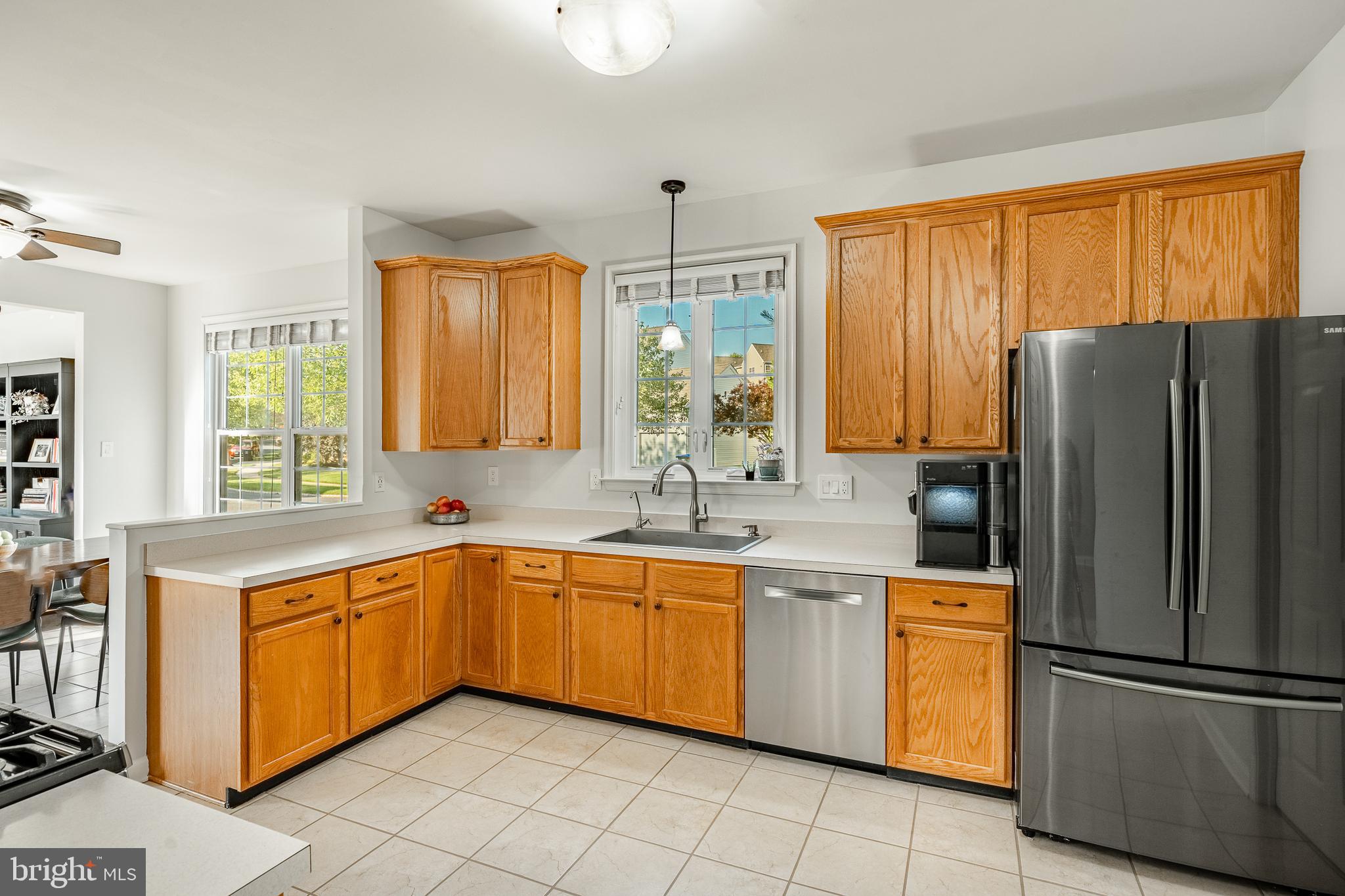 116 Hartman Road Pottstown, PA 19465 - Photo 6 of 49 a kitchen with stainless steel appliances granite countertop a refrigerator sink and cabinets