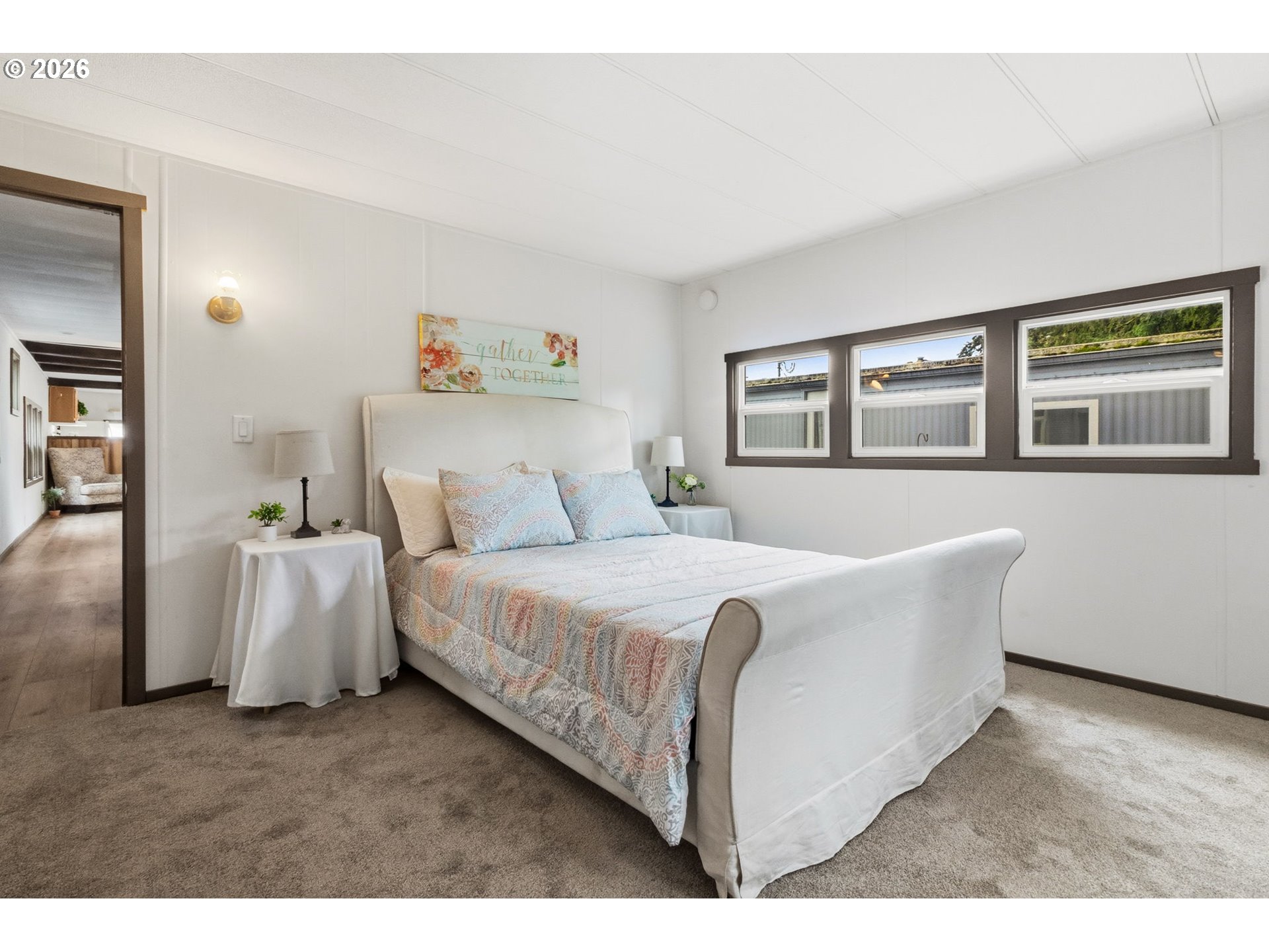 205 South 54th Street, Unit 76 Springfield, OR 97478 - Photo 12 of 41 a bedroom with a large bed and a window