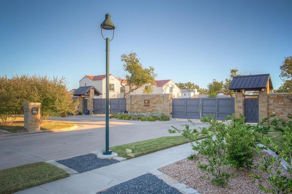 117 Pineland Place Fort Worth, TX 76114 - Photo 1 of 1 a view of a street with a building in the background