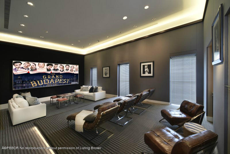 85 Curlew Road Manalapan, FL 33462 - Photo 11 of 30 a living room with furniture and a flat screen tv
