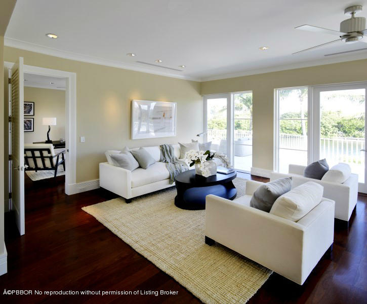85 Curlew Road Manalapan, FL 33462 - Photo 15 of 30 a living room with furniture and a large window
