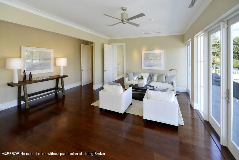 85 Curlew Road Manalapan, FL 33462 - Photo 16 of 30 a living room with furniture and a wooden floor