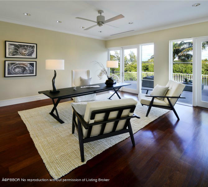 85 Curlew Road Manalapan, FL 33462 - Photo 19 of 30 a living room with furniture and a large window
