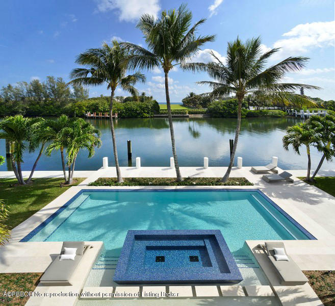 85 Curlew Road Manalapan, FL 33462 - Photo 21 of 30 a view of swimming pool with a table and chairs