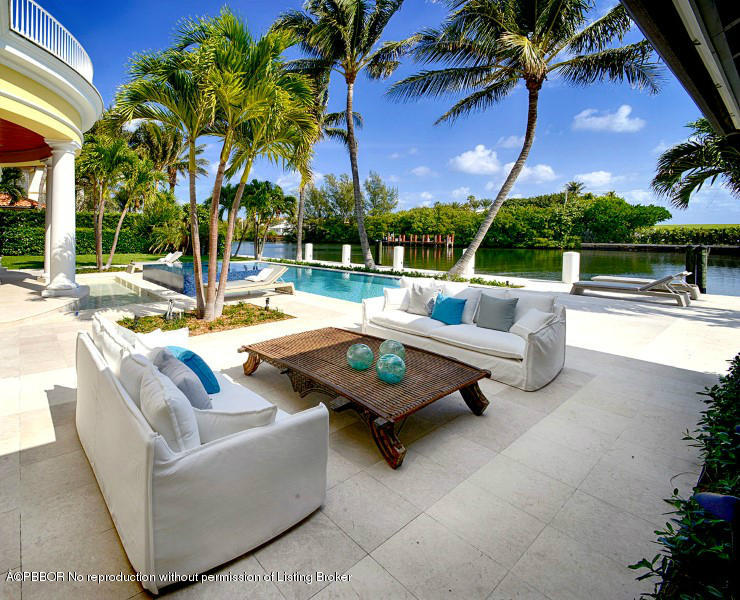 85 Curlew Road Manalapan, FL 33462 - Photo 24 of 30 a view of swimming pool with outdoor seating and a patio