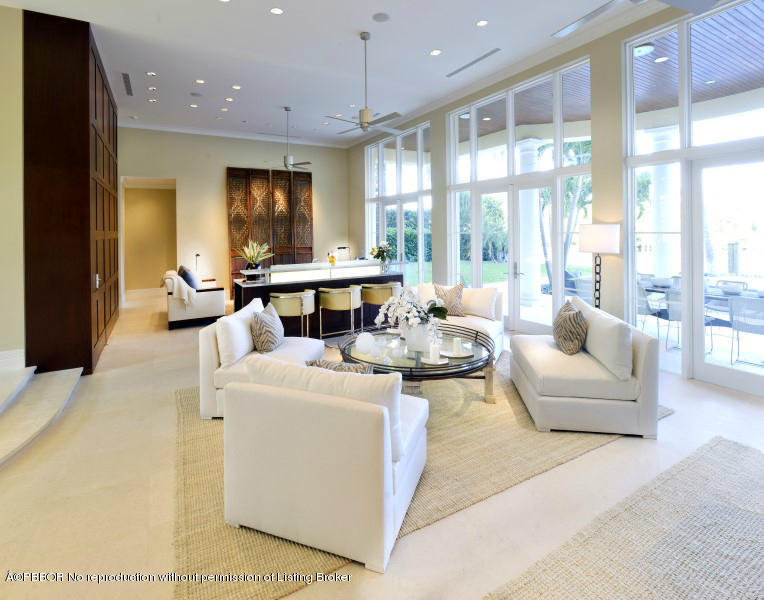 85 Curlew Road Manalapan, FL 33462 - Photo 4 of 30 a living room with furniture and a large window