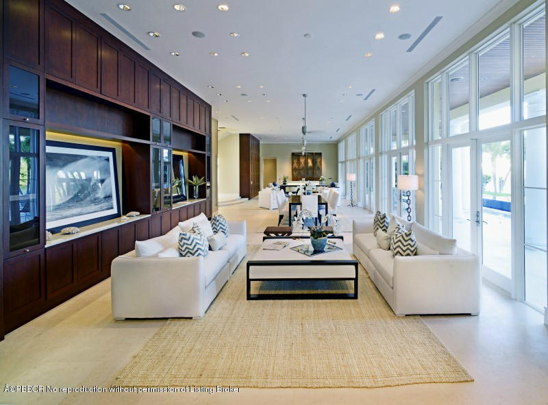 85 Curlew Road Manalapan, FL 33462 - Photo 5 of 30 a living room with furniture and a large window