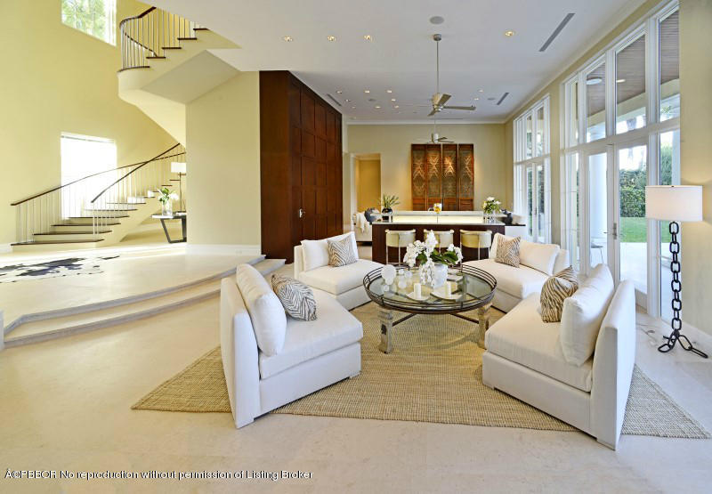 85 Curlew Road Manalapan, FL 33462 - Photo 7 of 30 a living room with furniture and a large window