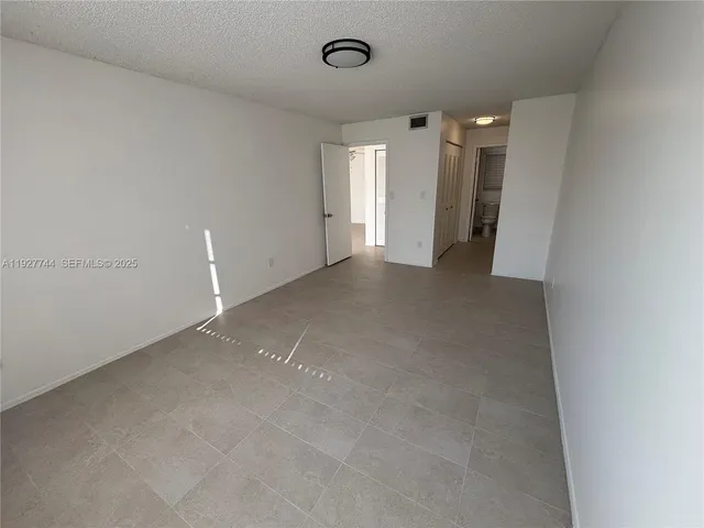 a view of a room with an entryway