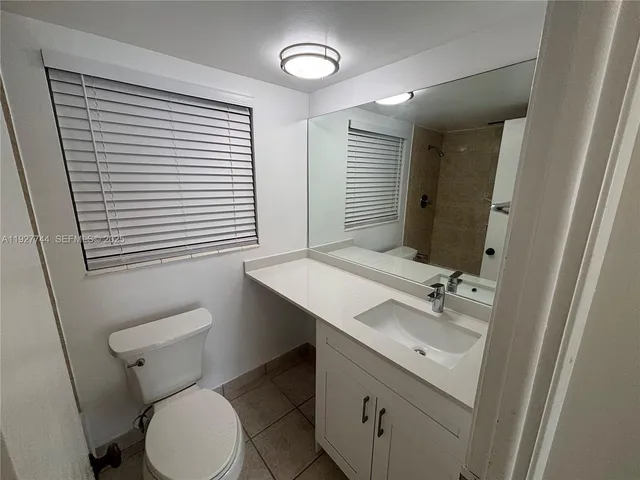 a view of a garden with a pathway