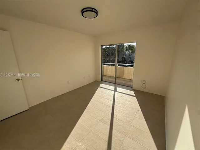 a view of a room with an empty space