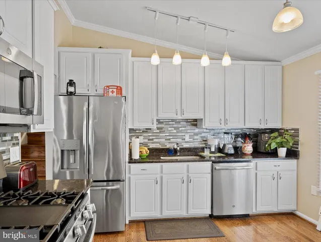 $715,000 | 13515 King Charles Drive, Chantilly, VA 20151