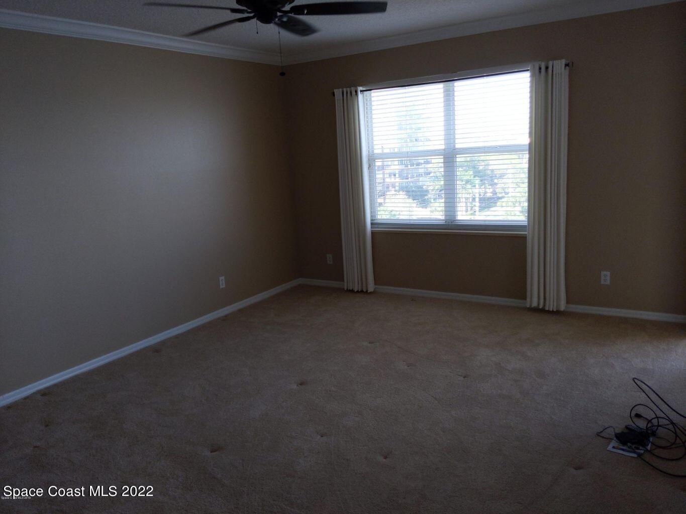 100 Riverside Drive, Unit 702 Cocoa, FL 32922 - Photo 12 of 33 an empty room with a window