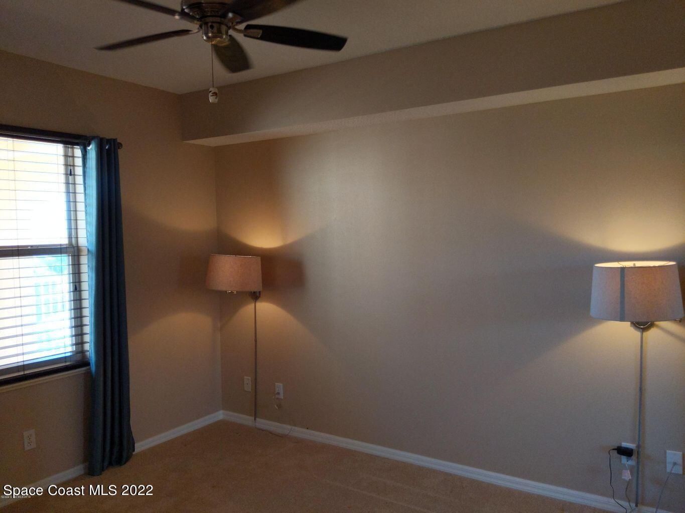 100 Riverside Drive, Unit 702 Cocoa, FL 32922 - Photo 17 of 33 a view of a small space with a fan