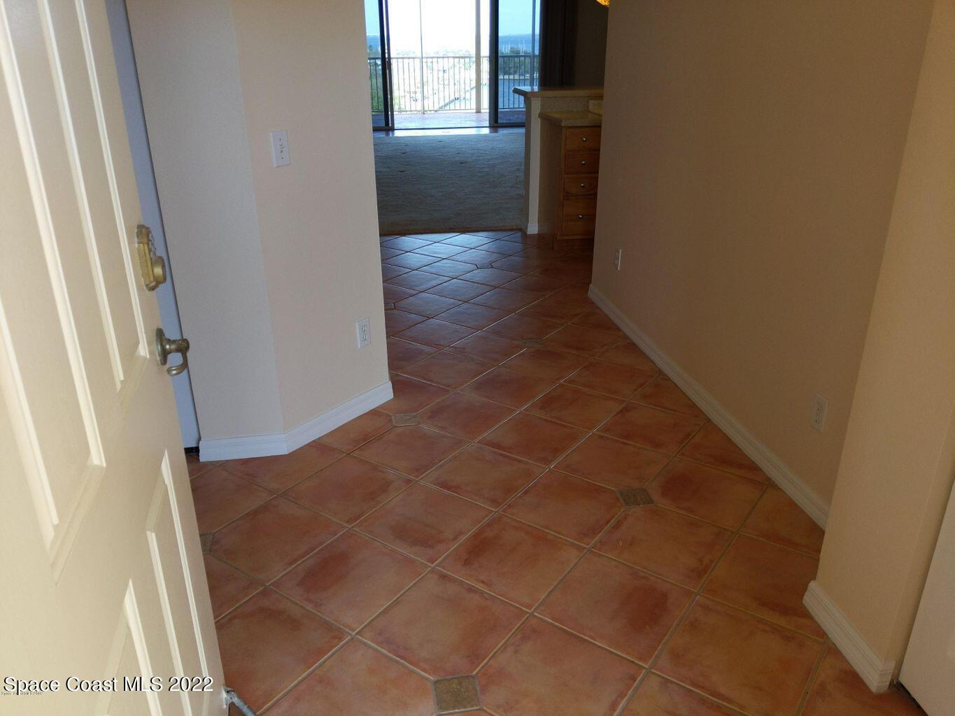 100 Riverside Drive, Unit 702 Cocoa, FL 32922 - Photo 2 of 33 a view of a hallway