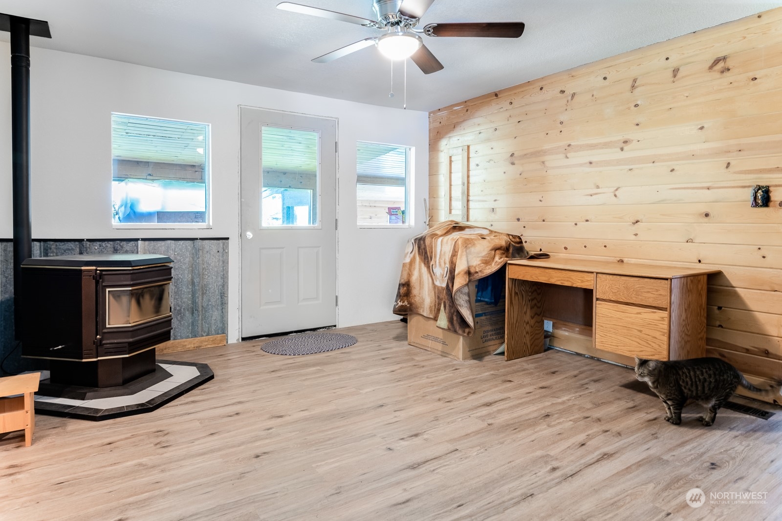 114 Twisp River Road Twisp, WA 98856 - Photo 11 of 35 a view of livingroom with furniture and a fireplace