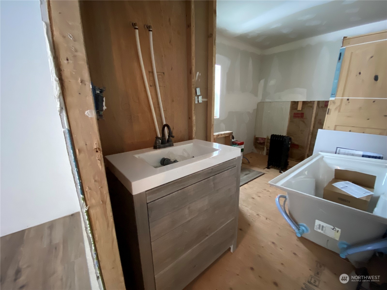 114 Twisp River Road Twisp, WA 98856 - Photo 16 of 35 a utility room with sink dryer and washer