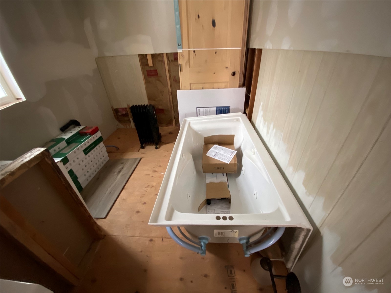 114 Twisp River Road Twisp, WA 98856 - Photo 17 of 35 a view of living room with furniture and a fireplace