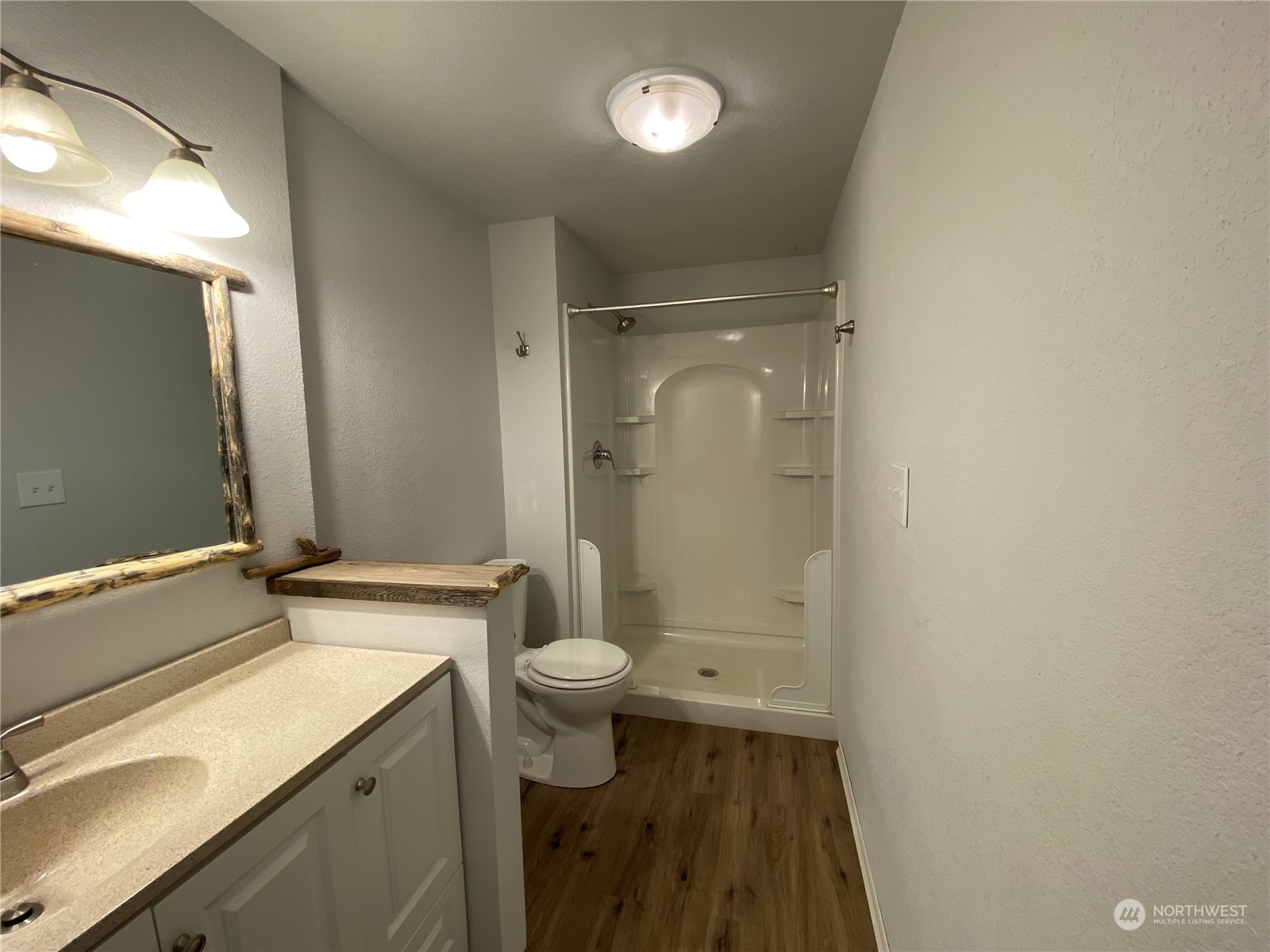 114 Twisp River Road Twisp, WA 98856 - Photo 21 of 35 a bathroom with a sink a toilet and shower