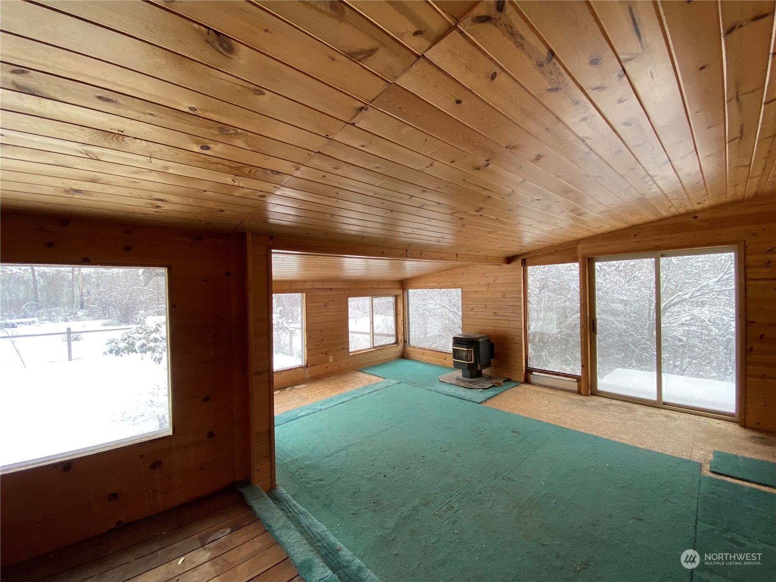 114 Twisp River Road Twisp, WA 98856 - Photo 25 of 35 a view of a room with large windows