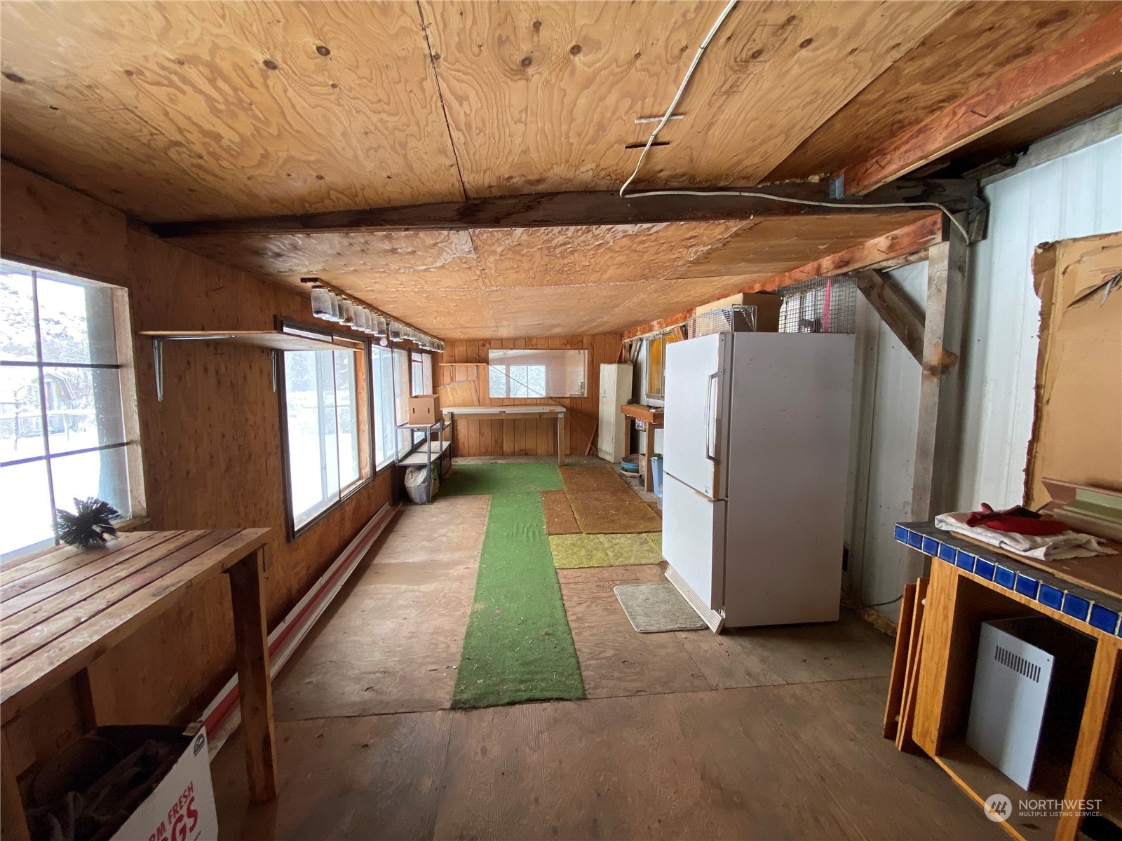 114 Twisp River Road Twisp, WA 98856 - Photo 27 of 35 a view of an empty room with a window