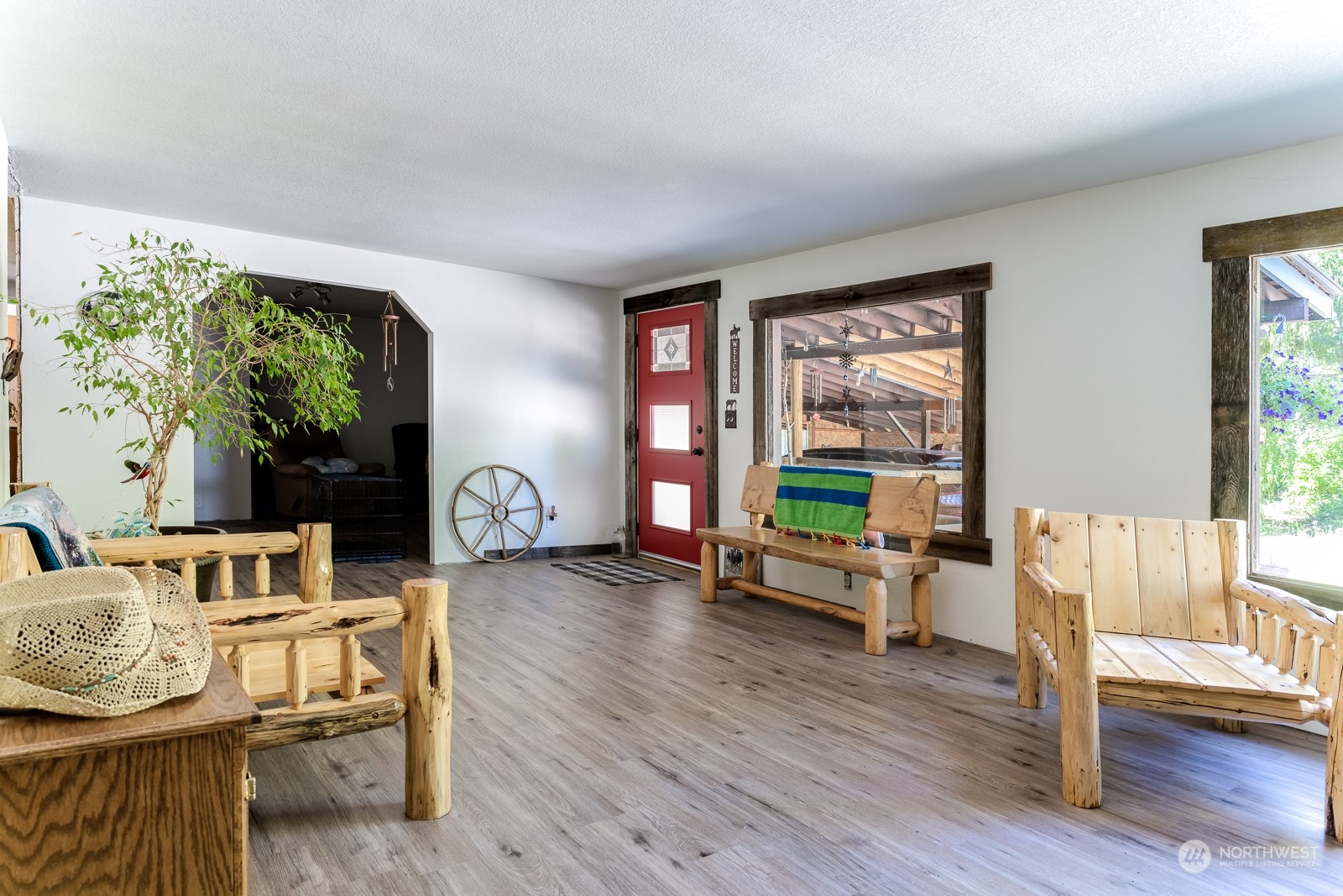 114 Twisp River Road Twisp, WA 98856 - Photo 7 of 35 a living room with furniture and a window