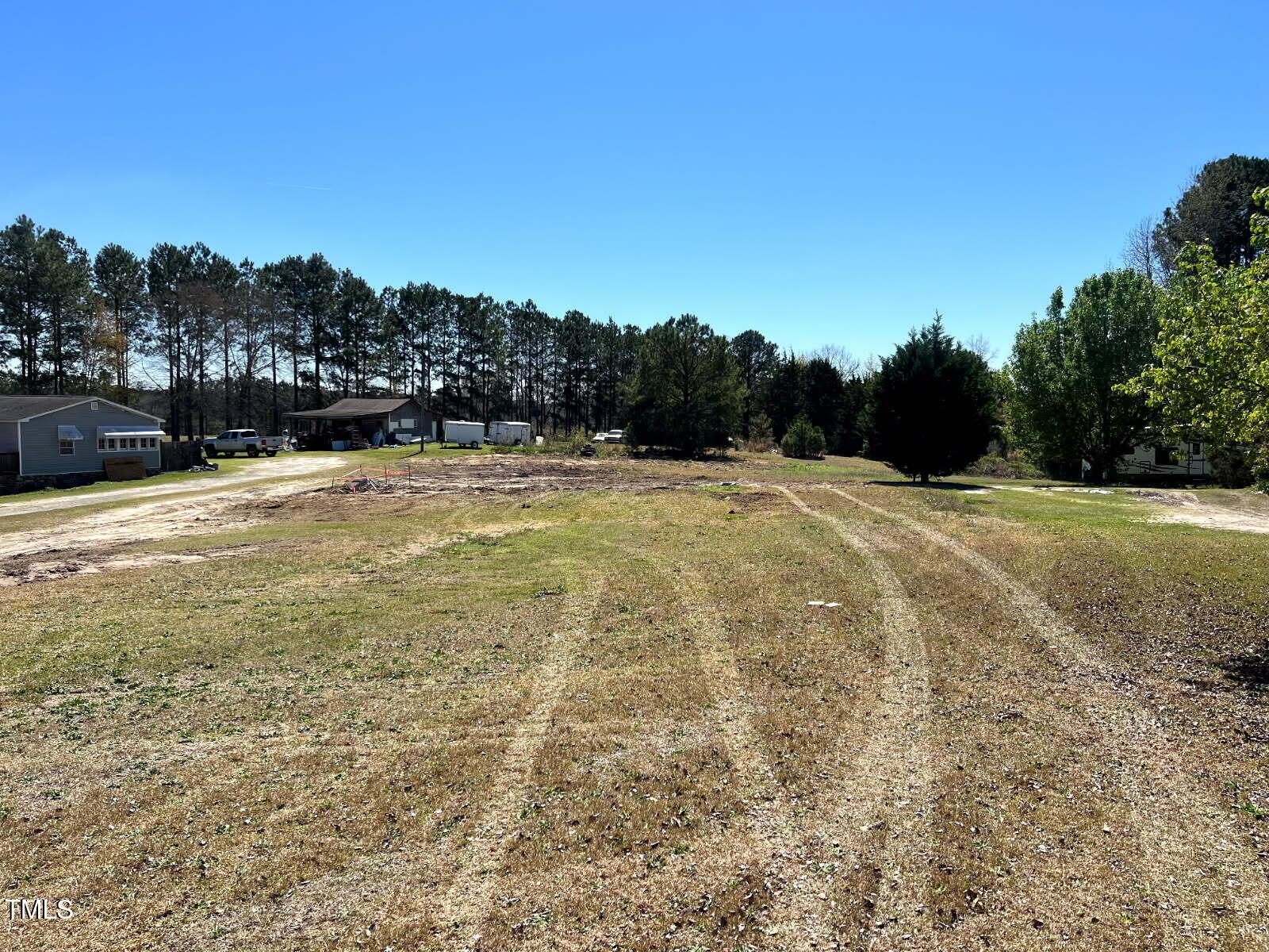a view of an outdoor space and tennis court
