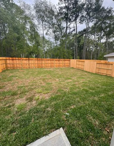 a view of yard with trees