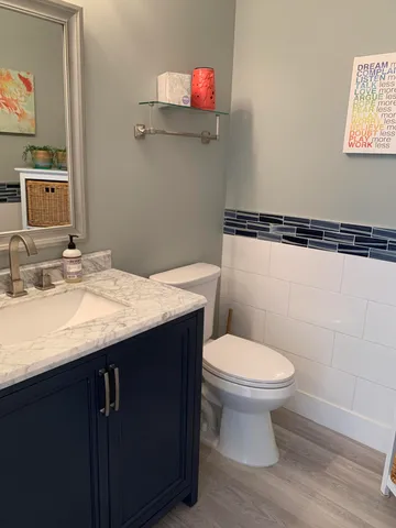 a bathroom with a sink and a toilet