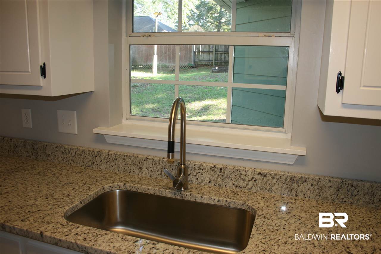 102 Meadow Wood Loop Daphne, AL 36526 - Photo 14 of 33 New wide sink and faucet...window to backyard