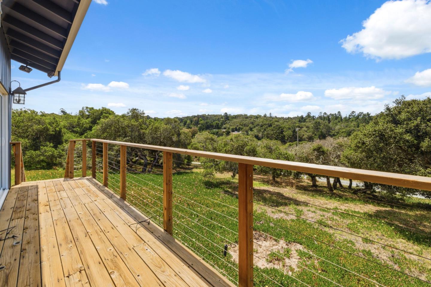 19269 Mallory Canyon Road, Unit D Salinas, CA 93907 - Photo 36 of 77 a view of balcony with wooden floor and fence