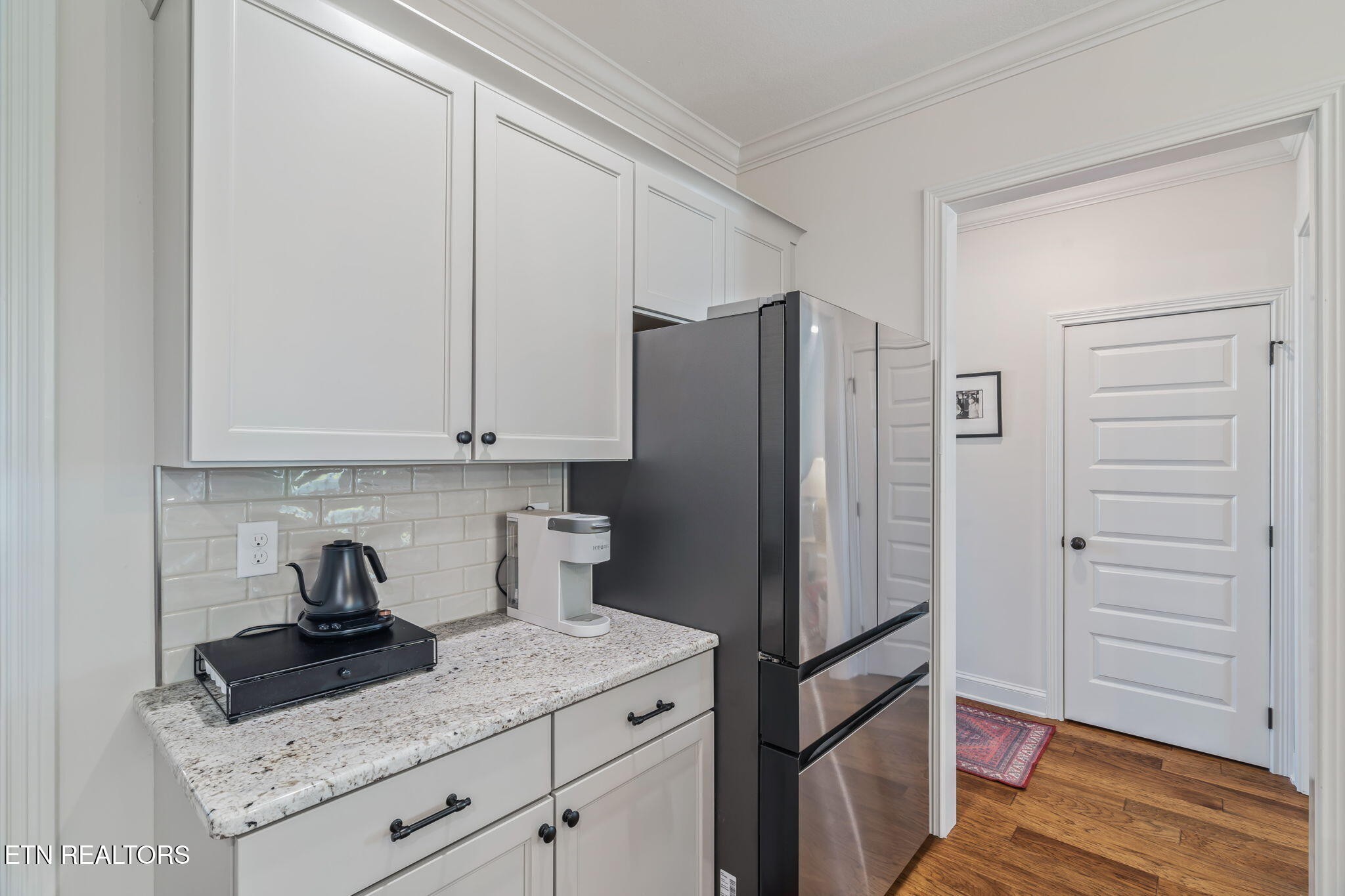 1146 Madison Oaks Road Knoxville, TN 37924 - Photo 15 of 48 a kitchen with a refrigerator and cabinets