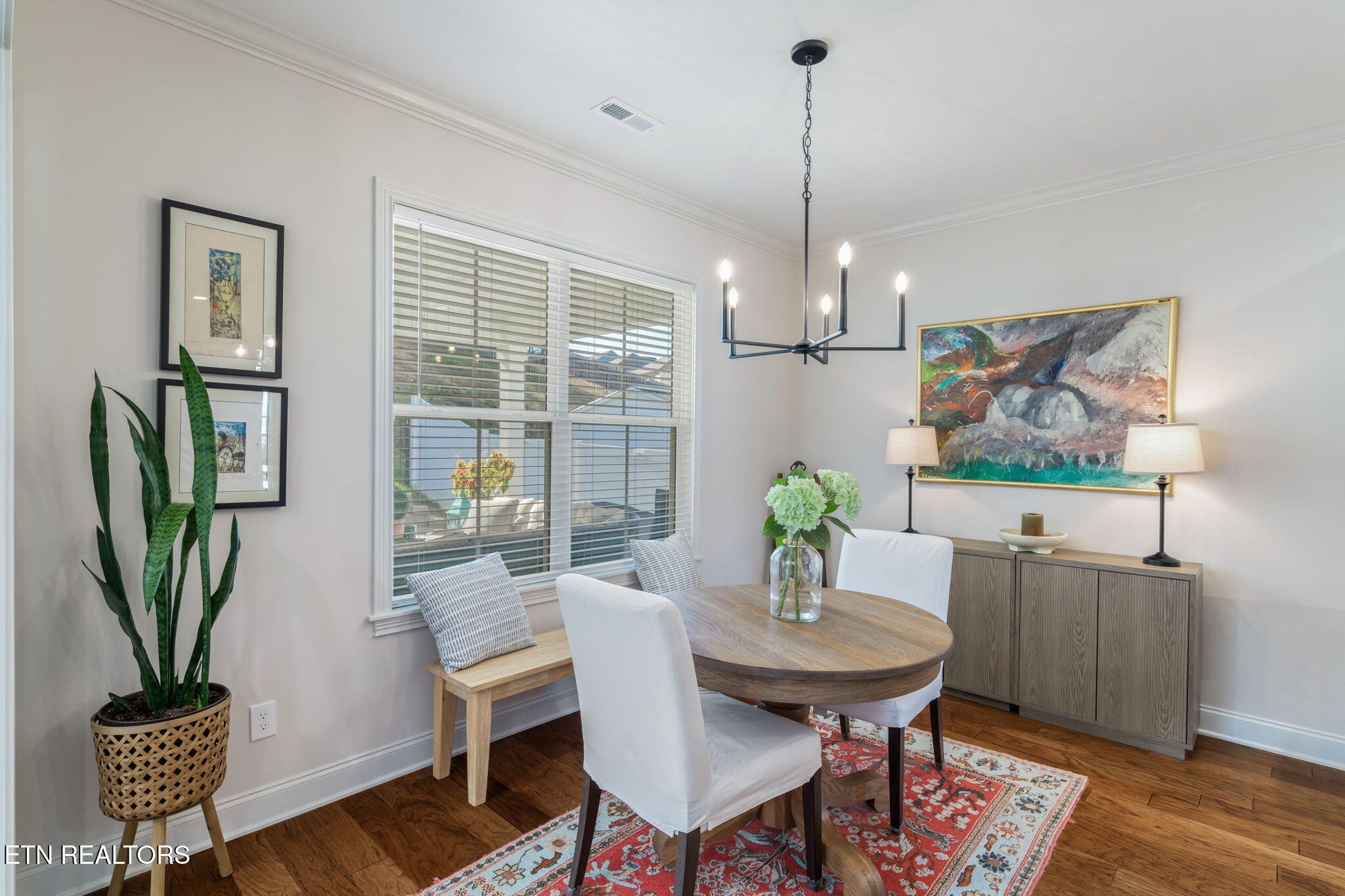 1146 Madison Oaks Road Knoxville, TN 37924 - Photo 17 of 48 a view of a dining room with furniture window and wooden floor