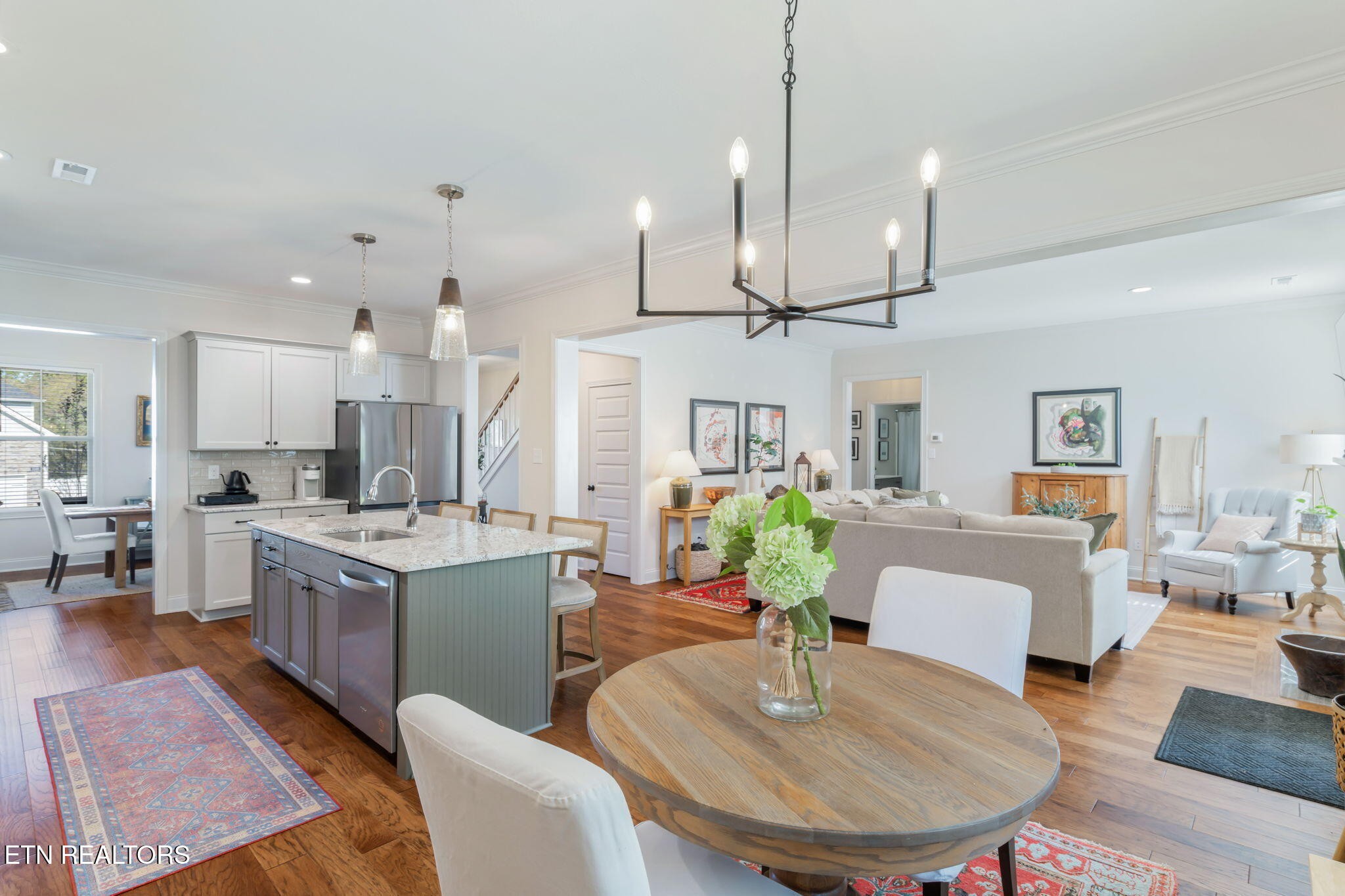 1146 Madison Oaks Road Knoxville, TN 37924 - Photo 18 of 48 a large kitchen with a table and chairs