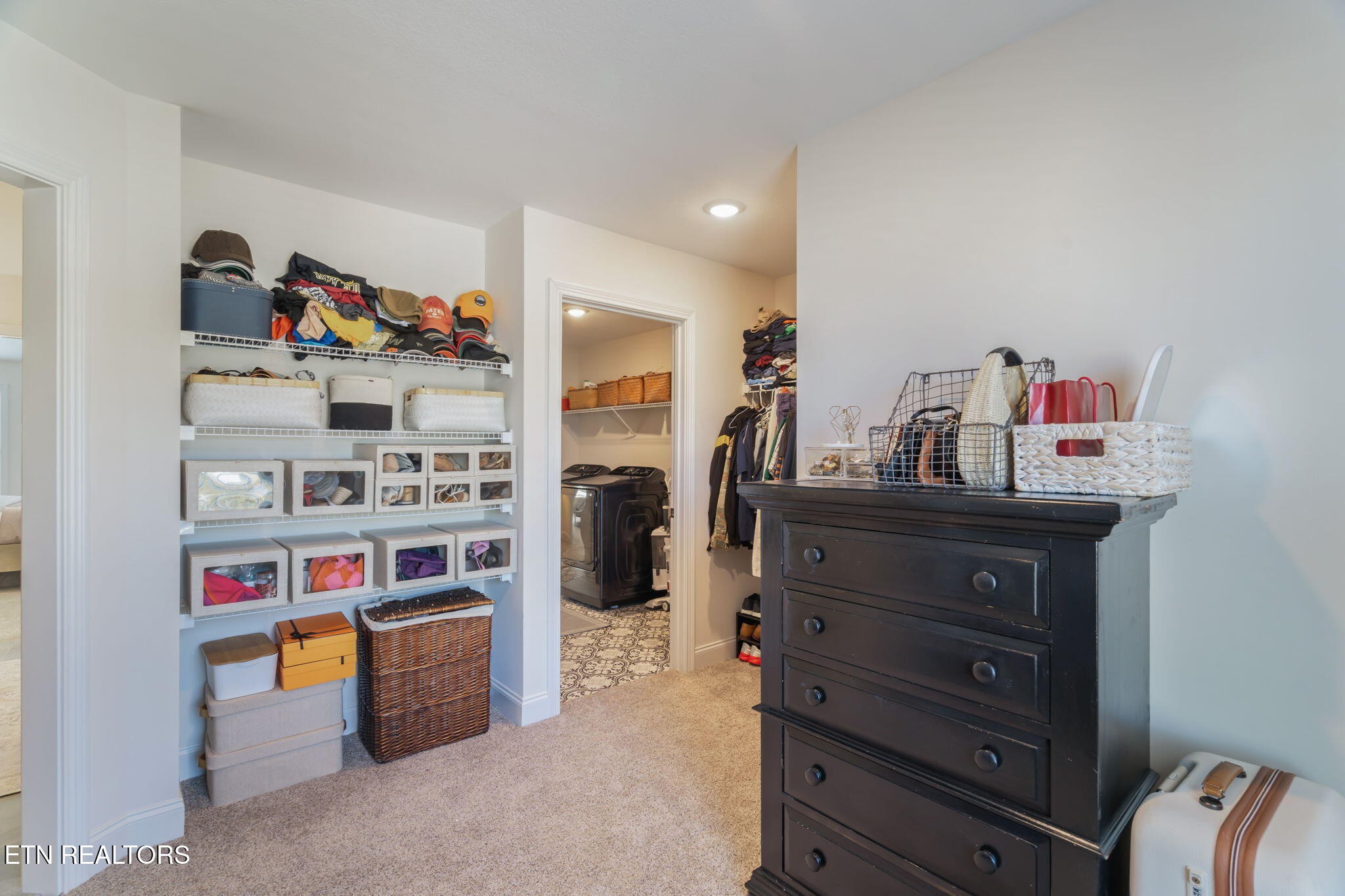 1146 Madison Oaks Road Knoxville, TN 37924 - Photo 32 of 48 a room with furniture a rug and a book shelf