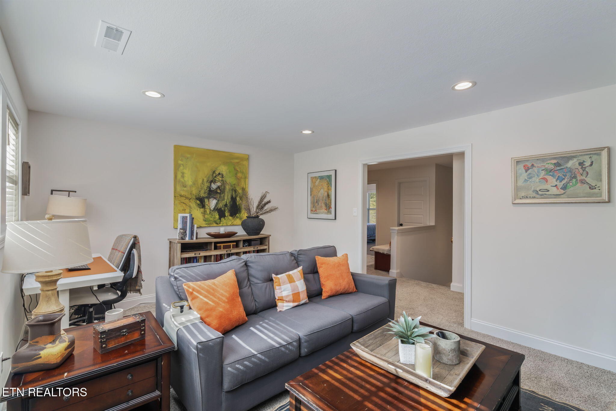 1146 Madison Oaks Road Knoxville, TN 37924 - Photo 37 of 48 a living room with furniture and a window