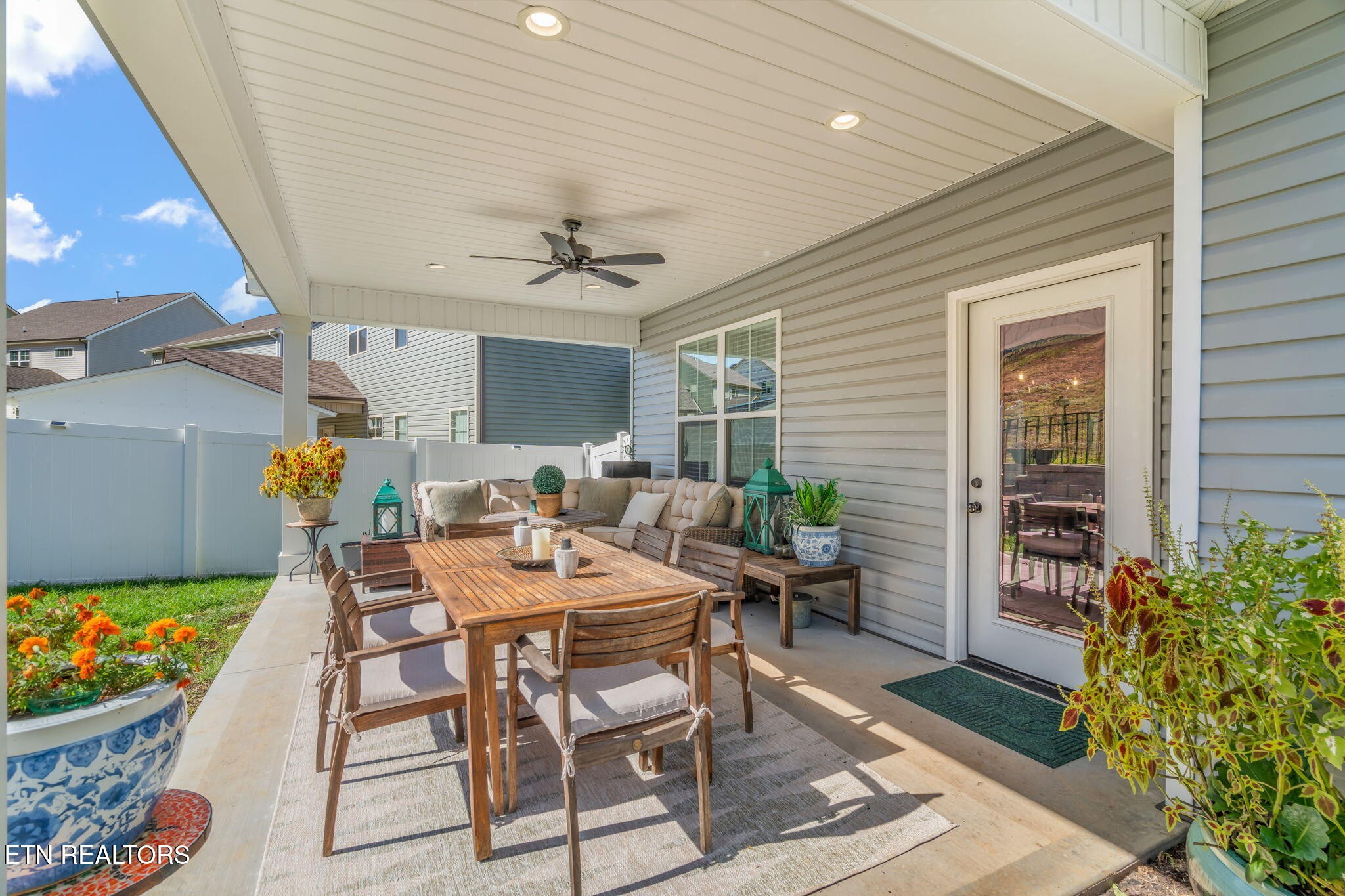 1146 Madison Oaks Road Knoxville, TN 37924 - Photo 44 of 48 a view of a dining room with furniture and wooden floor