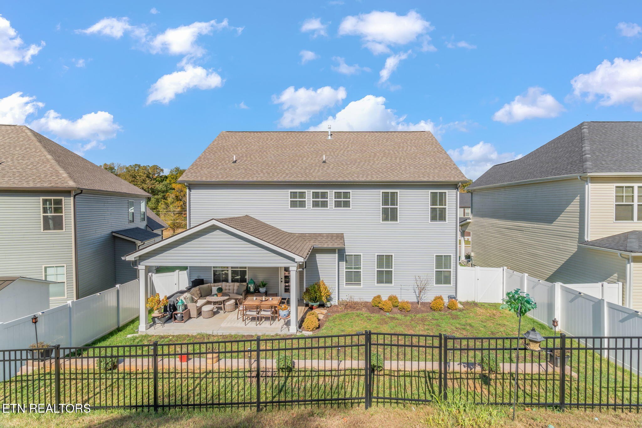 1146 Madison Oaks Road Knoxville, TN 37924 - Photo 47 of 48 a front view of a house with a garden