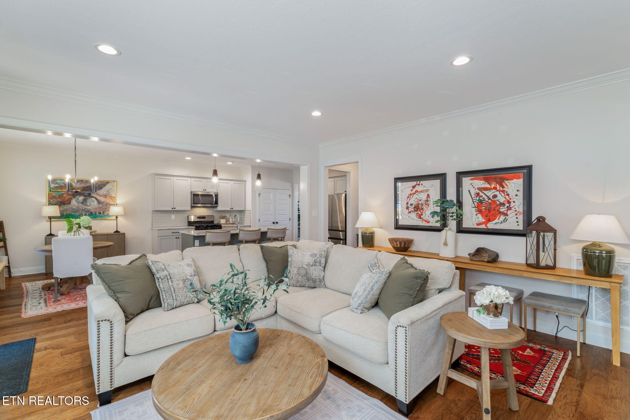 1146 Madison Oaks Road Knoxville, TN 37924 - Photo 7 of 48 a view of living room kitchen with furniture and a chandelier