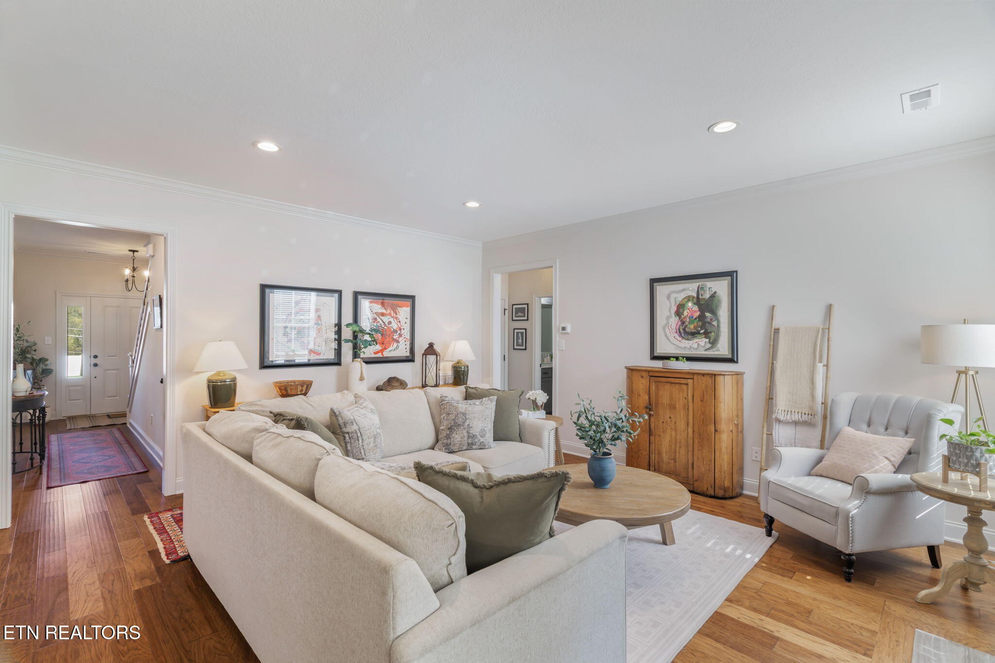 1146 Madison Oaks Road Knoxville, TN 37924 - Photo 8 of 48 a living room with furniture and a wooden floor