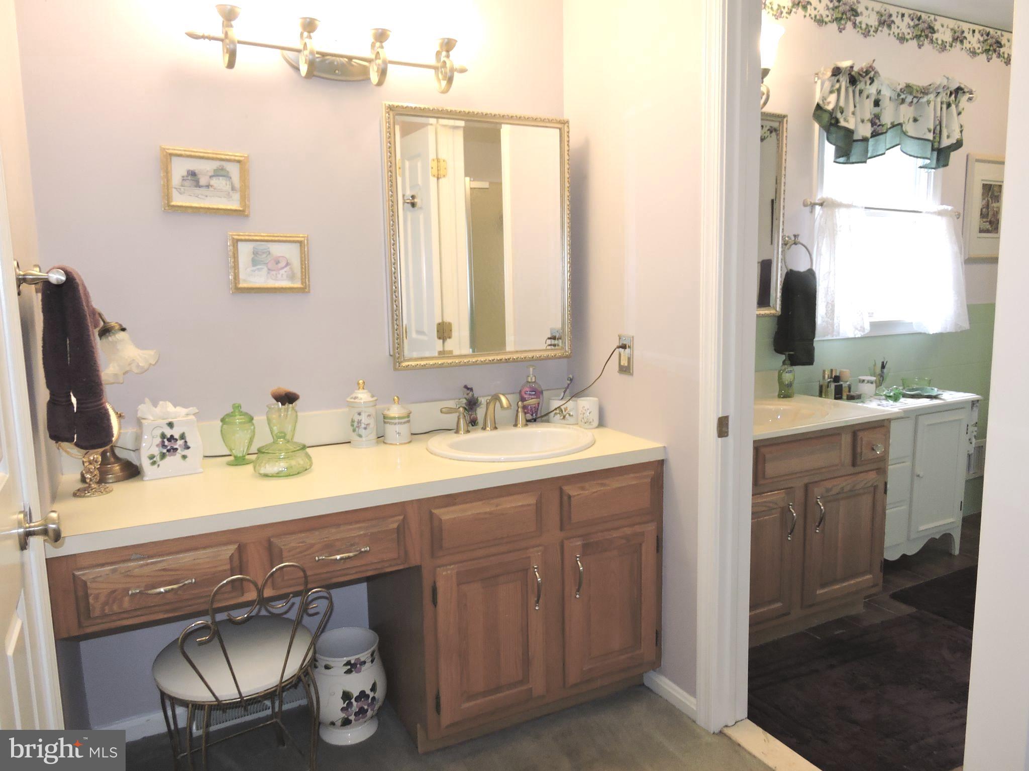 2758 Greene Lane Baldwin, MD 21013 - Photo 15 of 32 a bathroom with a sink double vanity and a mirror