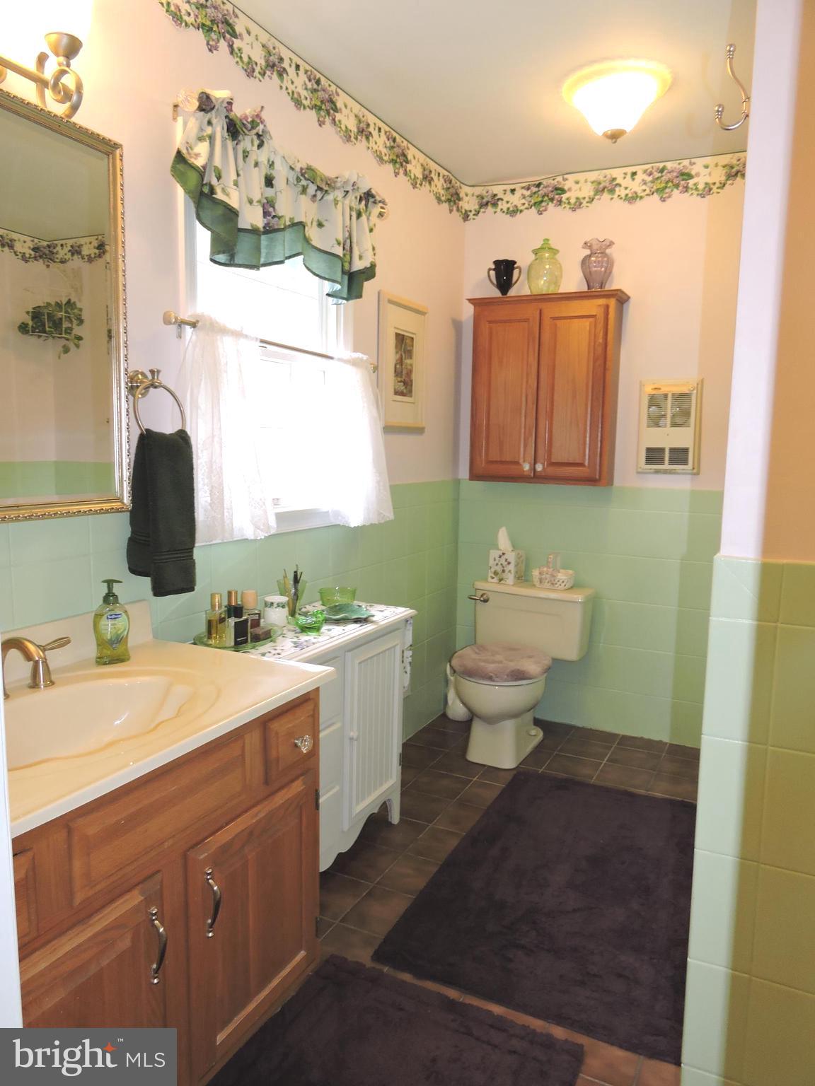 2758 Greene Lane Baldwin, MD 21013 - Photo 16 of 32 a bathroom with a sink and a mirror