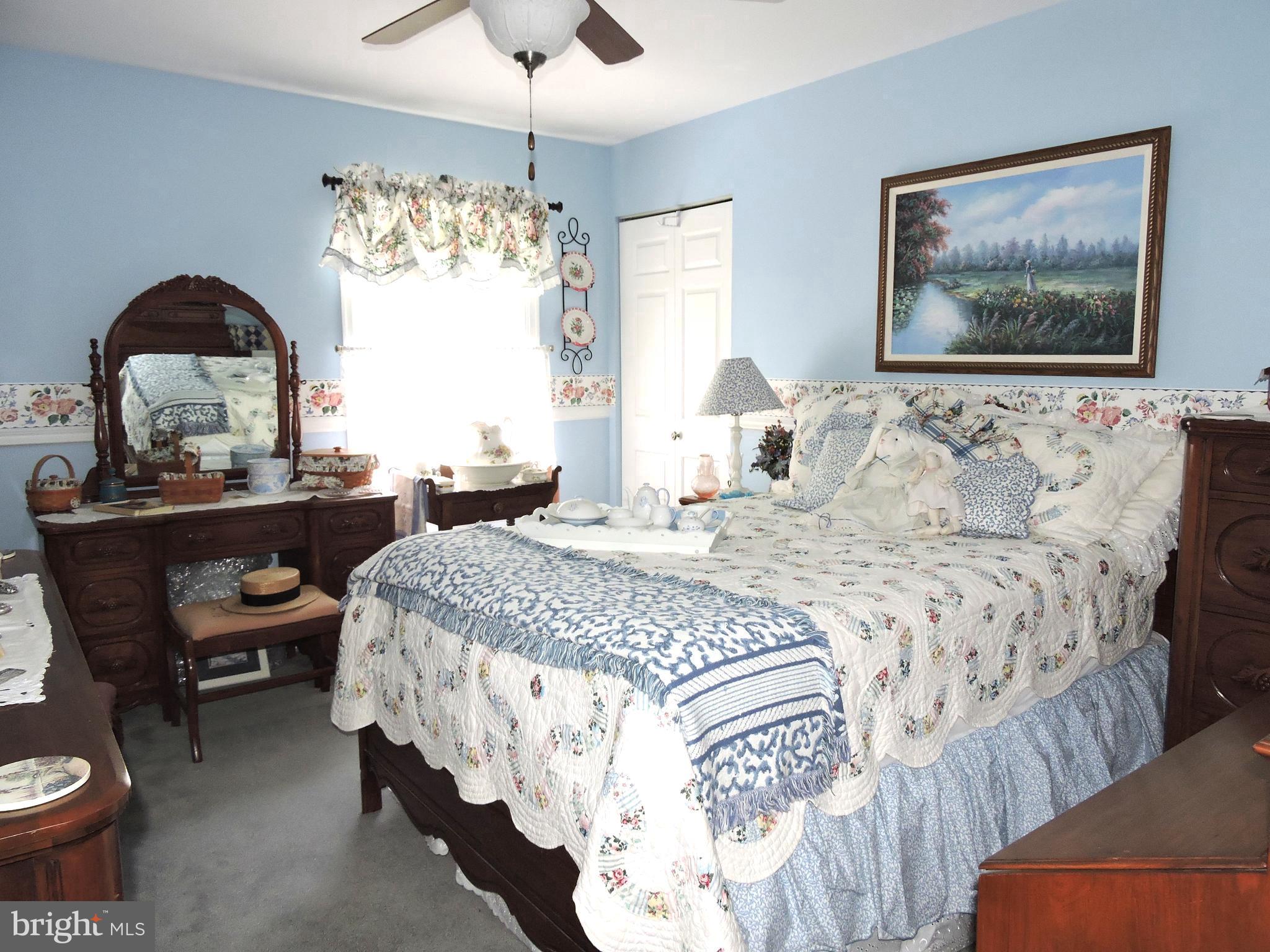2758 Greene Lane Baldwin, MD 21013 - Photo 23 of 32 a bedroom with a bed mirror and window
