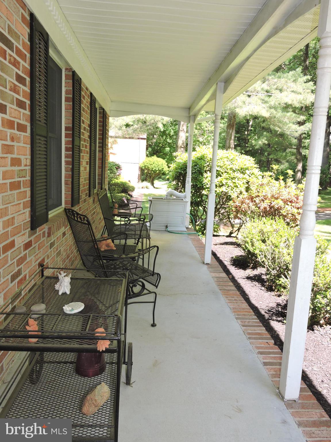 2758 Greene Lane Baldwin, MD 21013 - Photo 25 of 32 a dining room with furniture and a floor to ceiling window